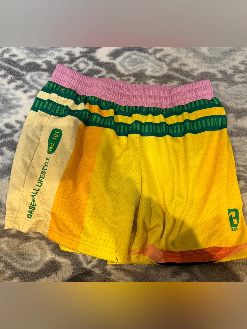Kids Yellow Athletic Shorts with Pink Waistband and Green Trim